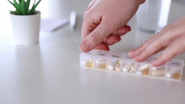 Medical Pill Box with Tablet Doses for Daily Take Medicine with Drugs Capsules alt