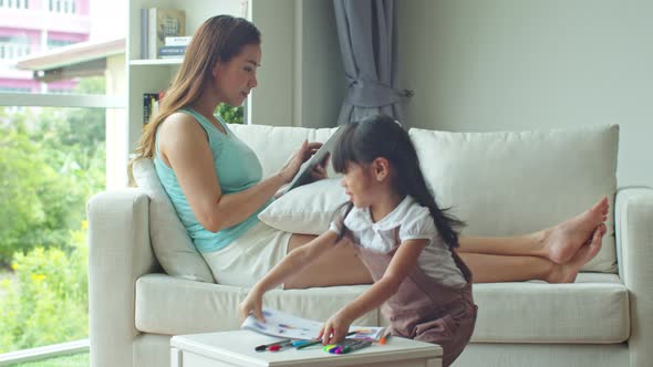 Daughter shows picture drawn but mother is not interested