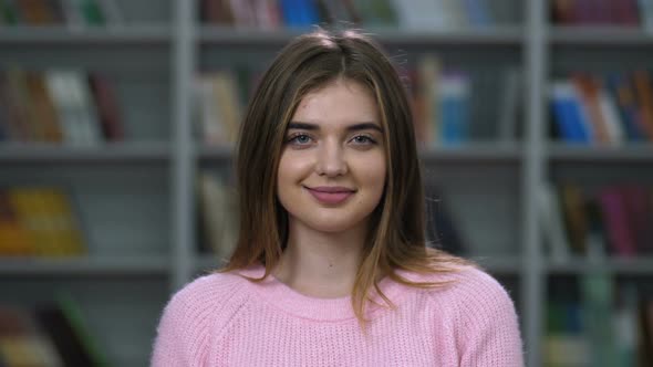 Beautiful Blonde Woman Smiling at the Camera alt