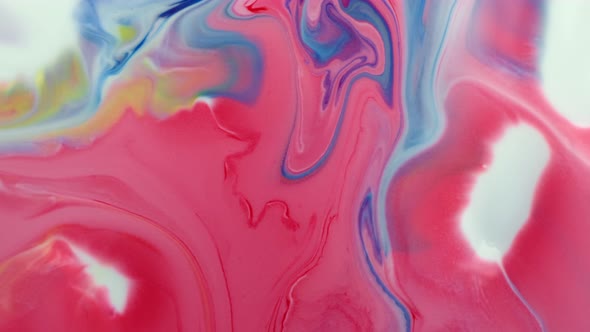 Multicolored Acrylic Paint. Slow Motion. Fantastic Surface. Abstract Colorful Paint. Top View alt