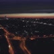 Aerial view of the streets of the city at night with Roundabout road junction 20 - VideoHive Item for Sale