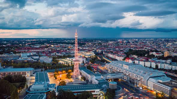 Day to Night Aerial View Hyper Lapse of Berlin cityscape with radio tower, Berlin, Germany alt