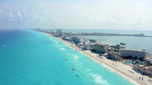 Aerial View of Cancun Mexico Showing Luxury Resorts and Blue Turquoise Beach alt