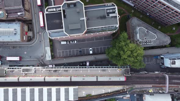 Top View of the Drone As the Train Leaves the Platform