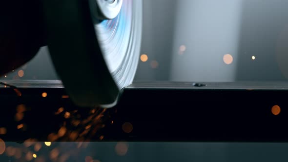 Super Slow Motion Detail Shot of Cutting Iron with Circular Saw at 1000 Fps alt