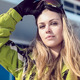 Girl with a Snowboard is Taking off her Sunglasses - VideoHive Item for Sale