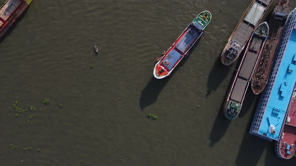 Aerial: Larger Cargo Boats Docking At Sadar ghat River Port, Dhaka, Bangladesh alt