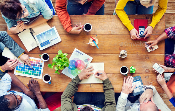 Group of Multiethnic Designers Brainstorming - Stock Photo - Images