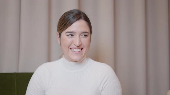 Woman Designer Happily Demonstrating a New Product Prototype of Simplistic Jewellery Box alt
