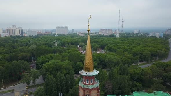Spike of Large Mosque, Aerial Shot, Flying Around of Spire with Golden Crescent, Symbol of Islam