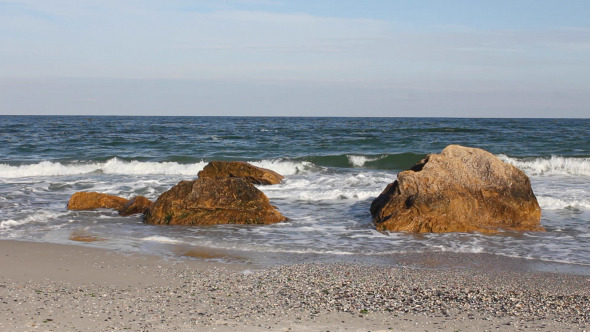 Sea Waves on the Rocky Shoreline