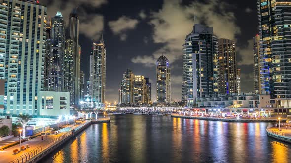 View of Dubai Marina Towers and Canal in Dubai Night Timelapse Hyperlapse alt