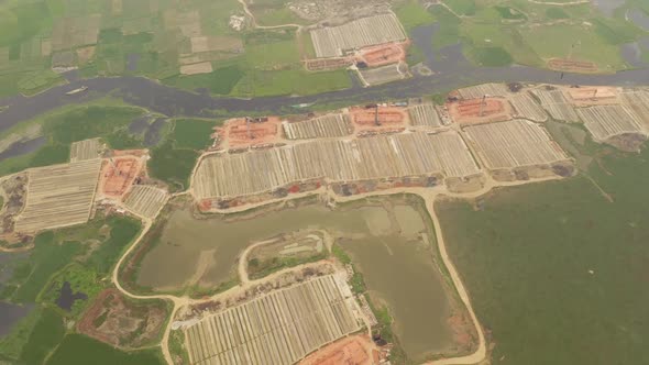 Aerial view of many brick factories, Dhaka province, Bangladesh. alt