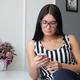 Girl Typing On A Mobile Phone - VideoHive Item for Sale