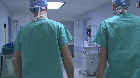 Two Male Doctors Head To Surgery