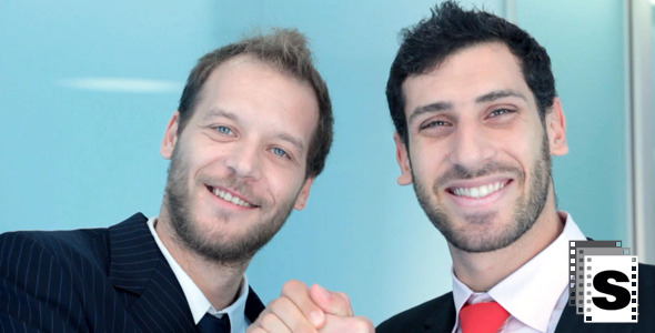 Businessman Closes Deal By Mobile Phone alt