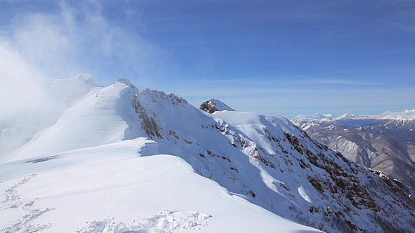 Top of Mountain. Cloud and Wind.
