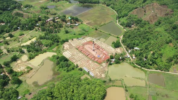 Aerial view of brick factories in Dhaka province, Bangladesh. alt