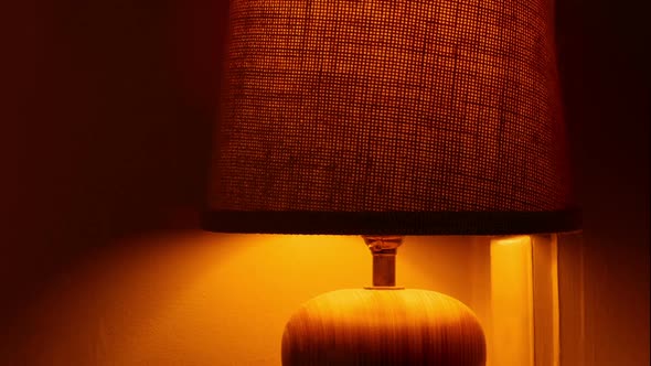 Table Lamp Turned On And Off Closeup alt