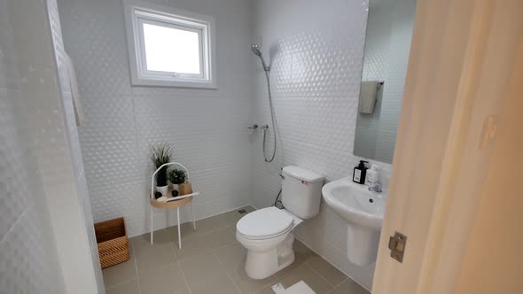 Clean White Stylish Bathroom With Shower Head alt