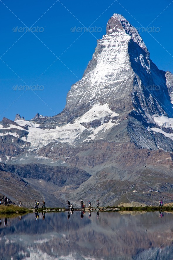Tourists in front of the Matterhorn - Stock Photo - Images
