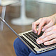 Man Sitting and Working on a Laptop Man Sitting and Working on a Laptop - VideoHive Item for Sale