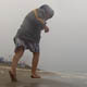 Mother And Son Running On A Rainy Beach Mother And Son Running On A Rainy Beach - VideoHive Item for Sale