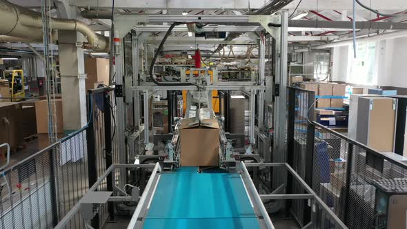 Logistics automation. Warehouse, preparation of cardboard boxes along the production line
