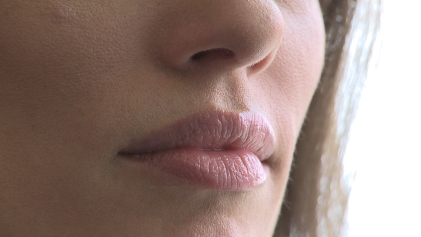 Closeup Of Woman's Mouth As She Converses (3 Of 3)