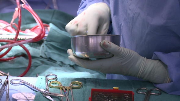 Surgical Technician Working During Surgery