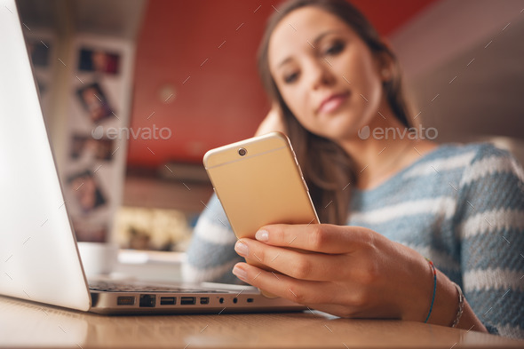 Teen girl with mobile phone - Stock Photo - Images
