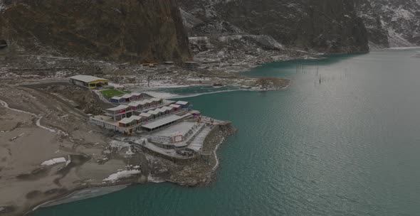 Aerial View Of Luxus Hunza Hotel In Pakistan. Dolly Pan Right Across Lake Attabad Lake alt