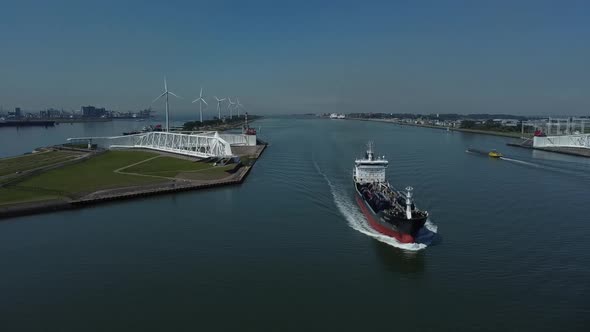 A tanker passes the Maeslantkering storm surge barrier in the Netherlands. alt