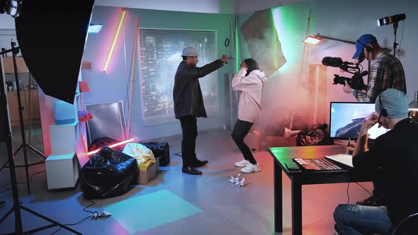 Film Producer Applauding Actors for Acting Performance in Film Scene alt