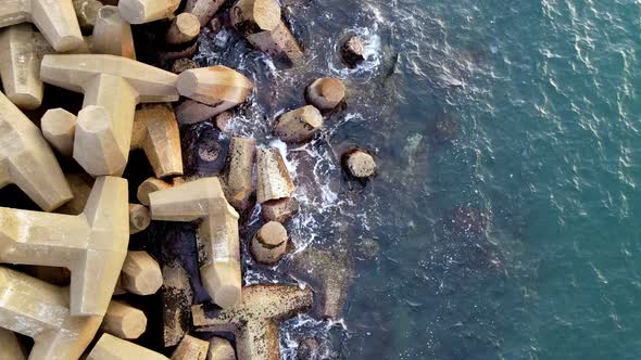 Aerial View of Concrete Sea Fortification Texture