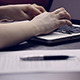 Woman Working on the Laptop and Write Contract Woman Working on the Laptop and Write Contract - VideoHive Item for Sale