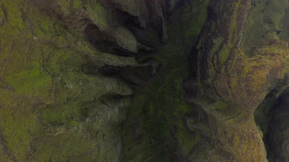 Topdown Aerial Footage Over Fantastic Volcanic Mountains on the Pacific Coast. Hawaii alt