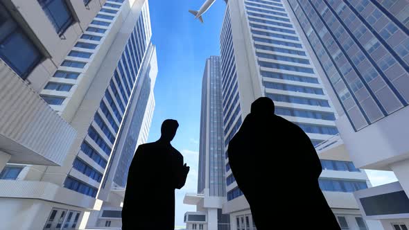 Silhouette Of Businessmen Negotiating And Communicating Under The Office Building