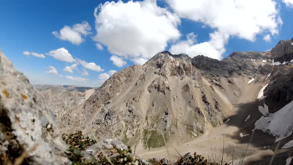 Shadows From the Clouds Float Down the Mountainside Landscape with Glacier Point in USA. Timelapse alt