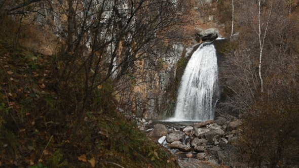 The Korbu Waterfall In Mountains Of Altay Republic alt