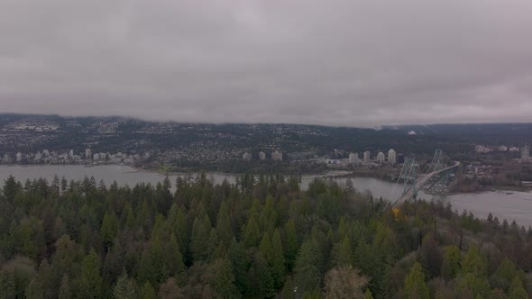Aerial view of Stanley Park and the Lions Gate Bridge in Vancouver, BC in 4K alt