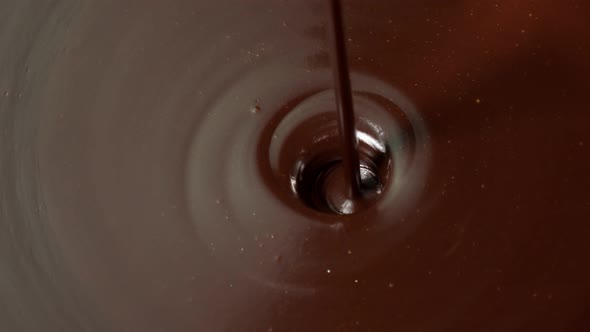 Pouring Premium Dark Melted Hot Chocolate Process of Making Confectionery Sweet Desserts Icing alt
