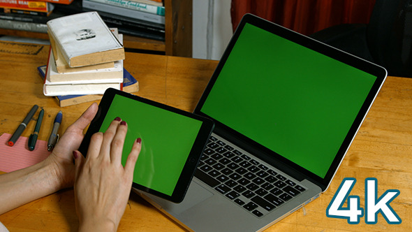Girl Using Tablet with Laptop