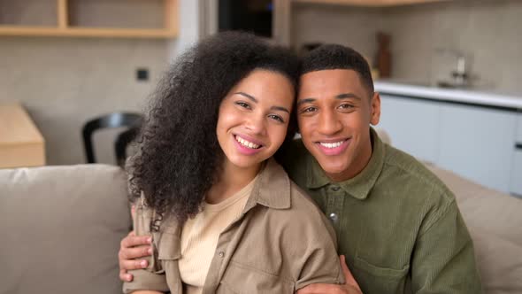 Happy Lovely Young Multiracial Couple Together at Home