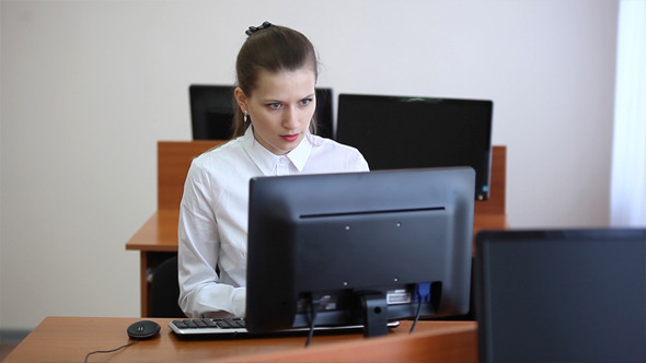 Girl Working in Classroom at Computer Typing