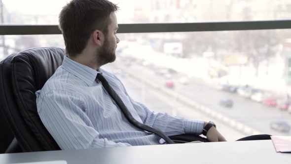 Happy Young Business  Man Look At Window alt