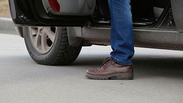 Man Sits In The Car 02 alt