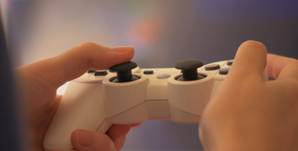 Woman Playing Video Game With Controller