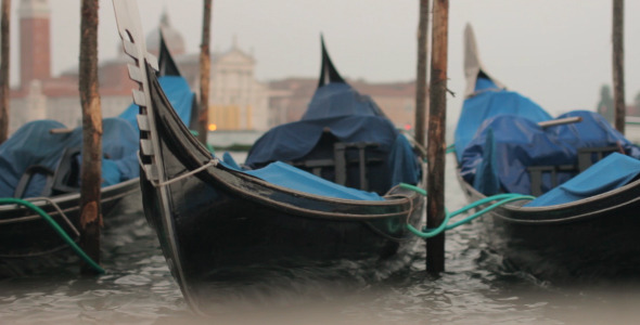 Gondolas Sway On The Waves In Venice