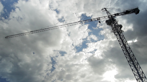 Building Crane On A Cloud Background alt